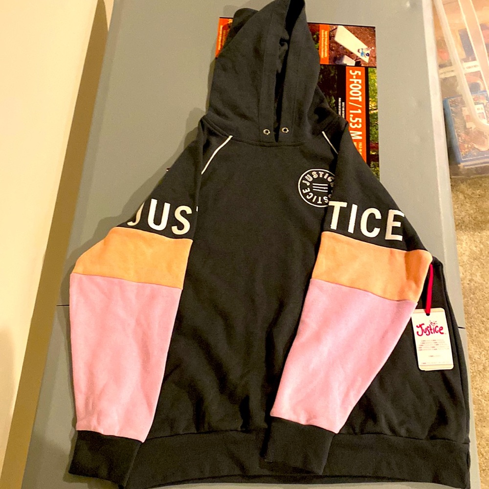 JUSTICE BRAND NEW HOODIE NEVER WORN WITH TAGS! Size: LARGE 12-14 year olds
